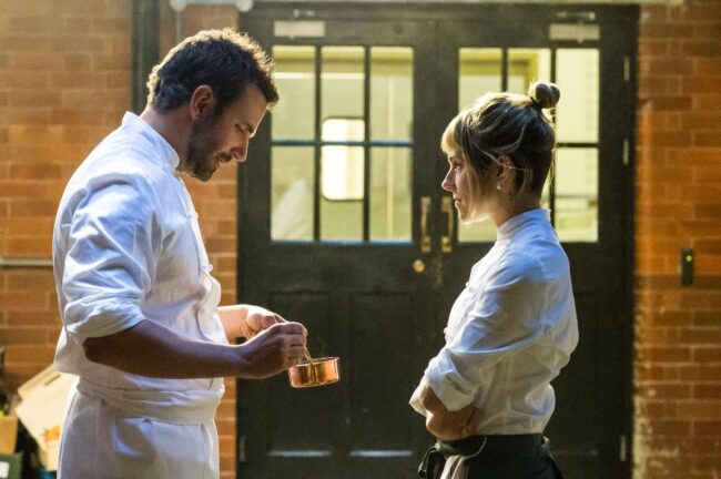 (L-R) BRADLEY COOPER and SIENNA MILLER star in BURNT.